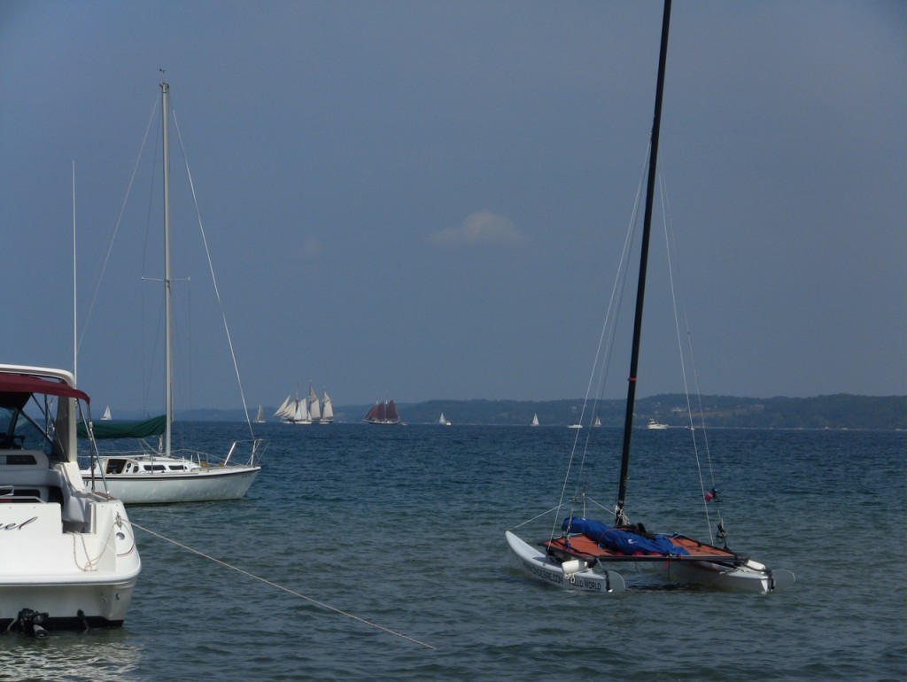 Hello World at anchor with majestic schooners in the background. Camera pulls back...